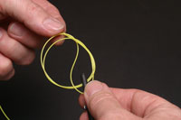 Continue to tighten until the knot begins to close