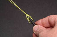 Tighten further until knot closes completely