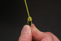 Tighten further until knot closes completely