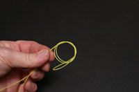 Tie a second overhand knot in the loop