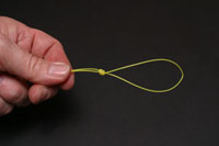 Tighten and close knot