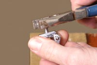 Remove sprue, this can be returned to the pot for re-use. 