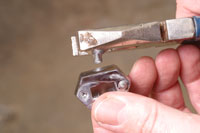 A completely flush finish can be achieved by filing away the remaining protrution. 