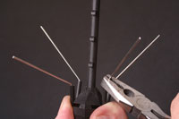 Bend wires to form outward angle